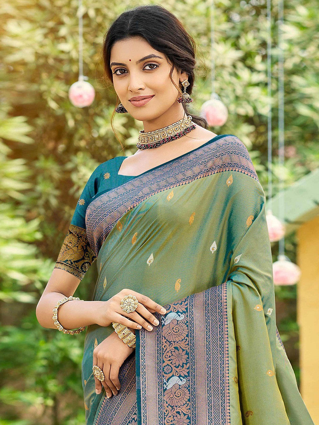 Classic Sage Green Floral & Peacock Design Zari Woven Silk Blend Saree With Trendy Tassel Pallu
