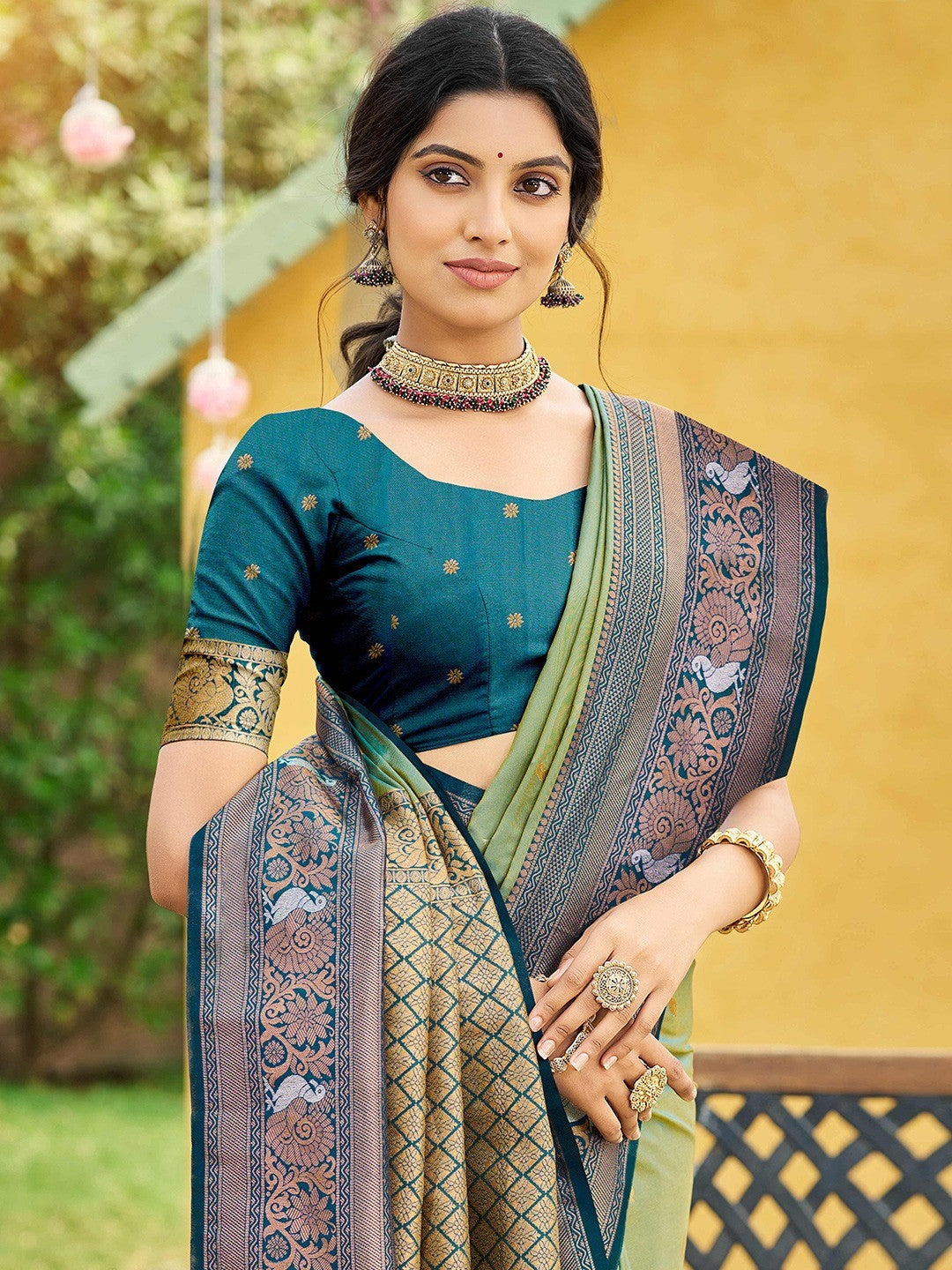 Classic Sage Green Floral & Peacock Design Zari Woven Silk Blend Saree With Trendy Tassel Pallu