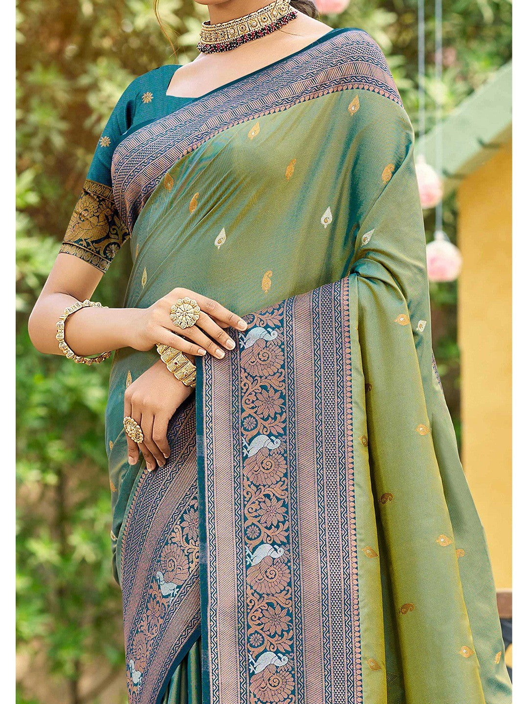 Classic Sage Green Floral & Peacock Design Zari Woven Silk Blend Saree With Trendy Tassel Pallu