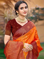 Graceful Orange Zari Woven Silk Blend Saree With Floral Motif Detailing & Elegant Tassels Pallu
