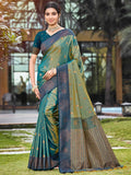 Graceful Rama Green Zari Woven Silk Blend Saree With Floral Motif Detailing & Elegant Tassels Pallu