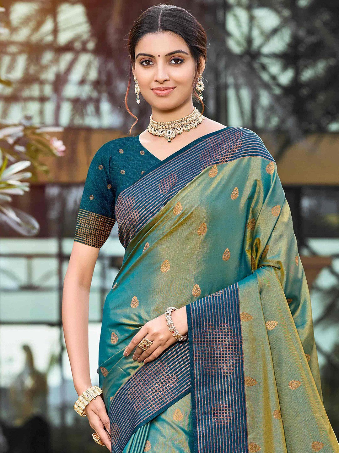 Graceful Rama Green Zari Woven Silk Blend Saree With Floral Motif Detailing & Elegant Tassels Pallu