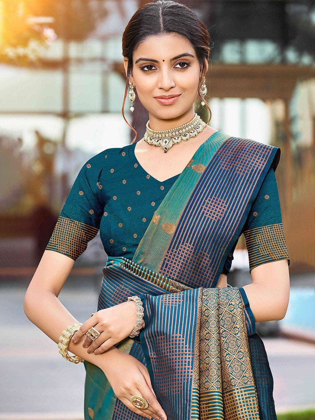 Graceful Rama Green Zari Woven Silk Blend Saree With Floral Motif Detailing & Elegant Tassels Pallu