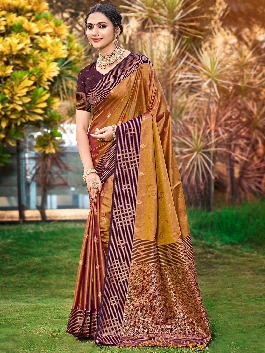 Graceful Golden Brown Zari Woven Silk Blend Saree With Floral Motif Detailing & Elegant Tassels Pallu