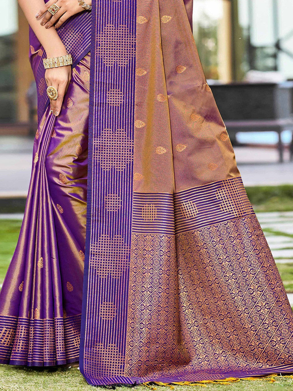 Graceful Violet Zari Woven Silk Blend Saree With Floral Motif Detailing & Elegant Tassels Pallu