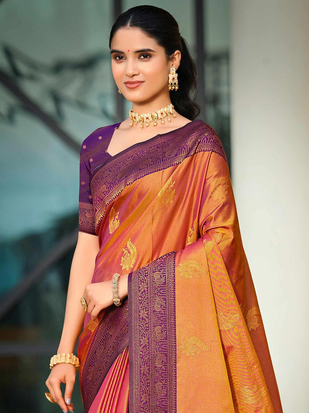 Classic Burnt Orange Peacock & Floral Motif Zari Woven Silk Blend Saree With Decorative Tassel Pallu