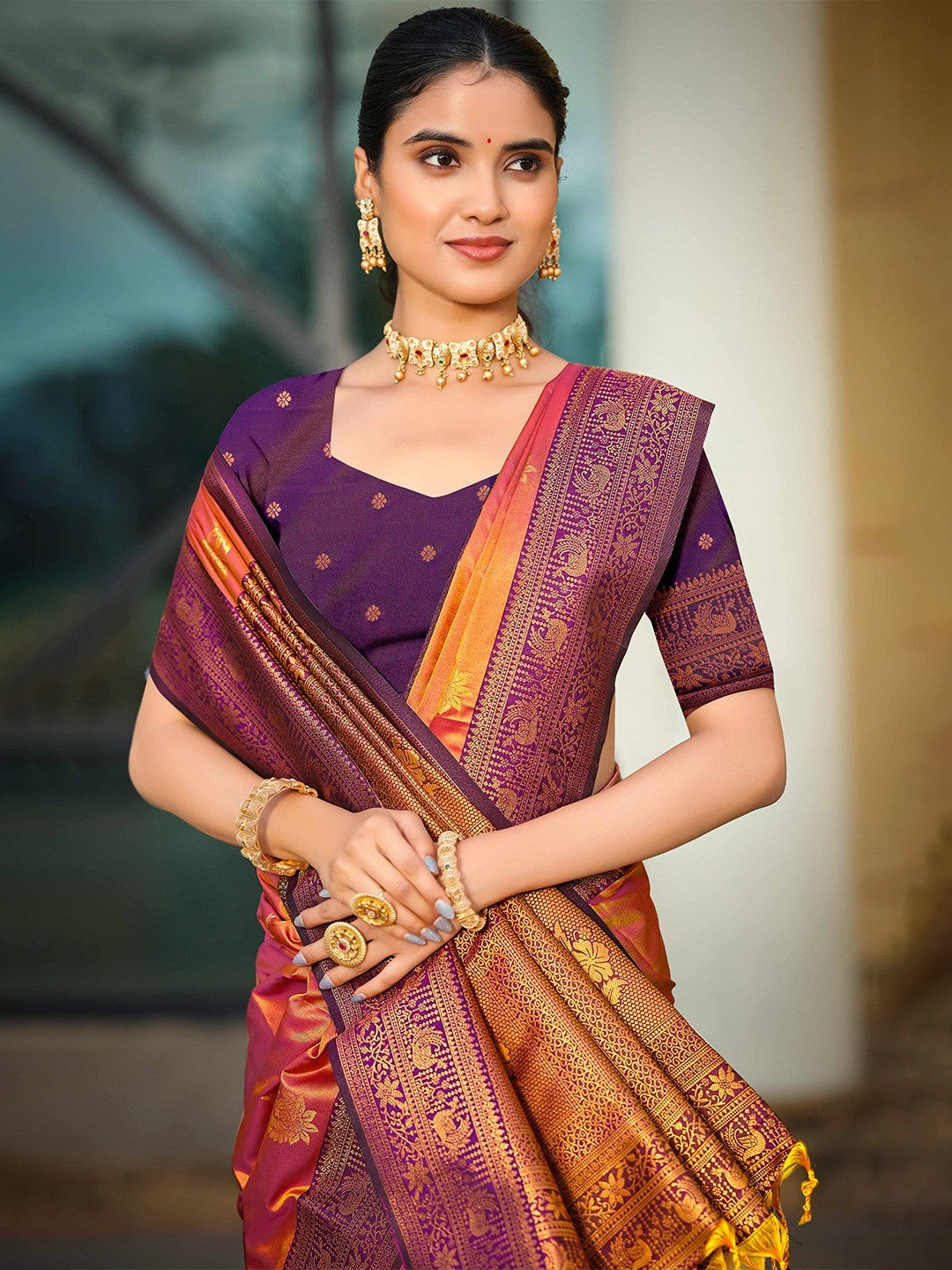 Classic Burnt Orange Peacock & Floral Motif Zari Woven Silk Blend Saree With Decorative Tassel Pallu
