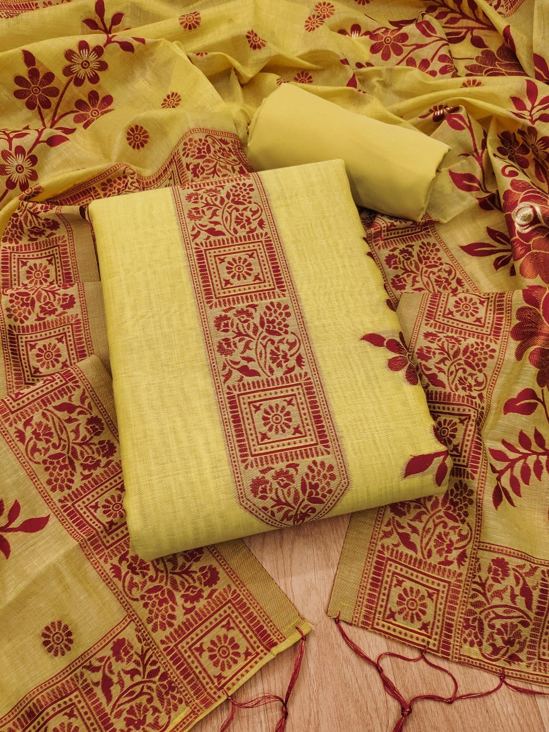 Yellow Cotton Blend Dress Material with Floral Patterns and Jamdani Woven Detailing