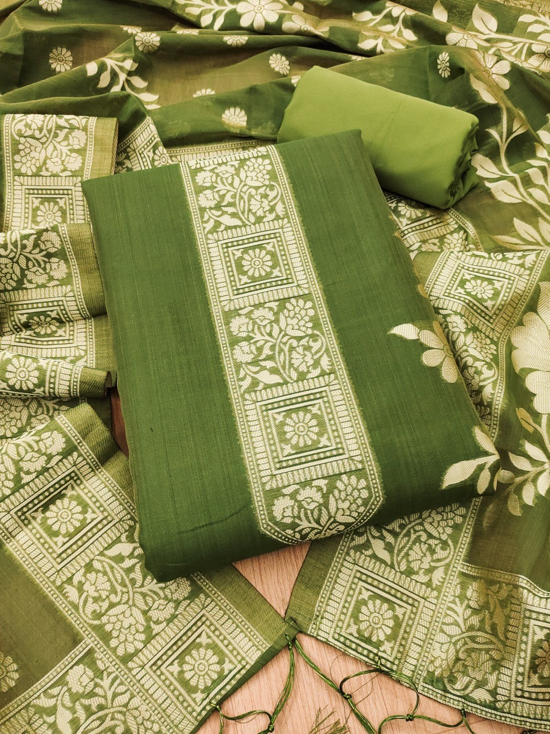 Green Cotton Blend Dress Material with Floral Patterns and Jamdani Woven Detailing