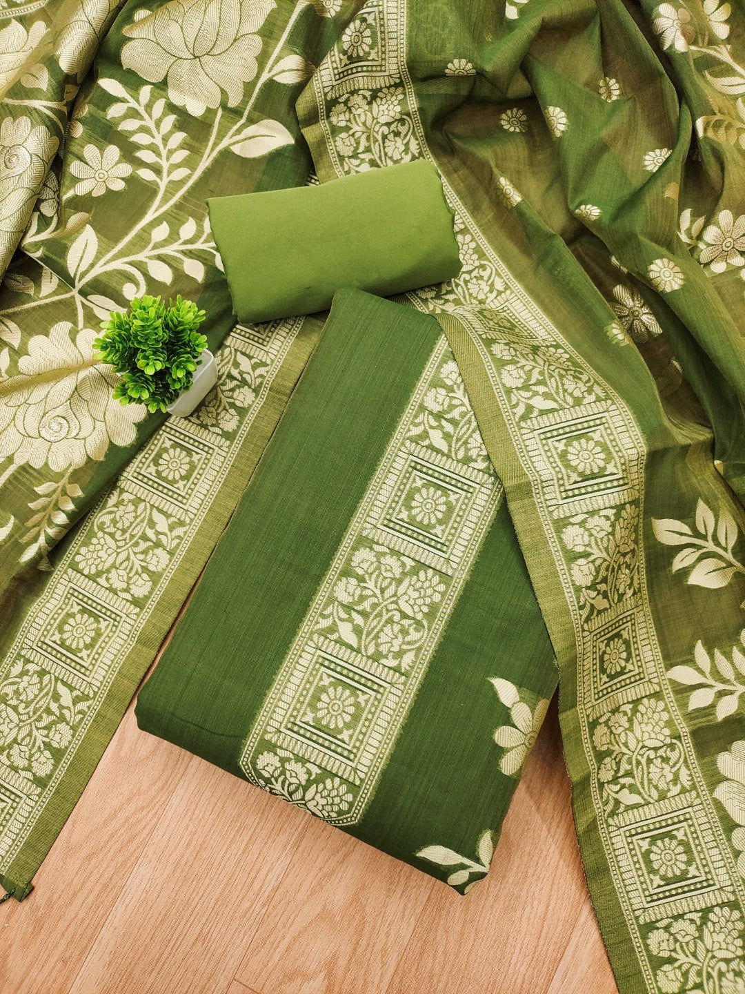 Green Cotton Blend Dress Material with Floral Patterns and Jamdani Woven Detailing