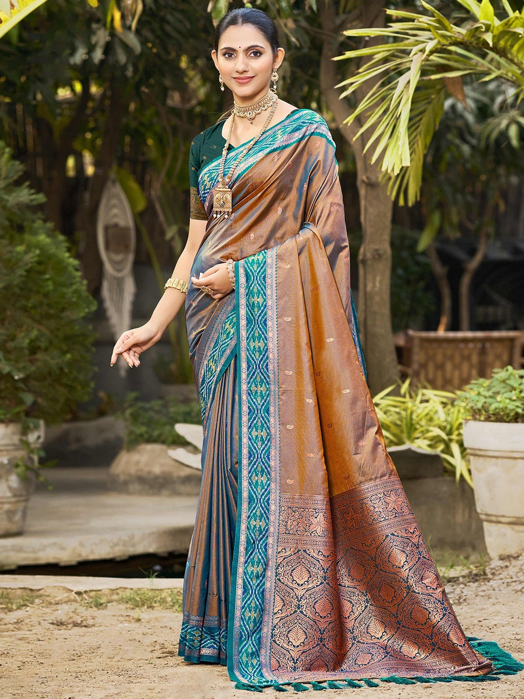 Graceful Brown Paisley & Floral Design Zari Work Silk Blend Saree With Attractive Tassels Pallu