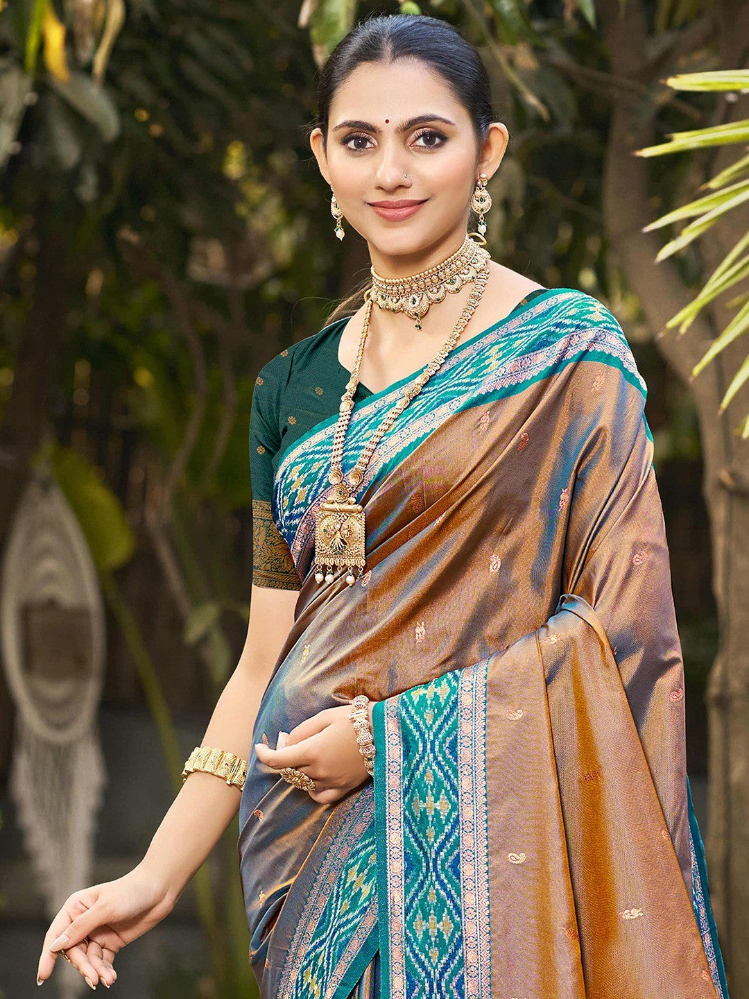 Graceful Brown Paisley & Floral Design Zari Work Silk Blend Saree With Attractive Tassels Pallu