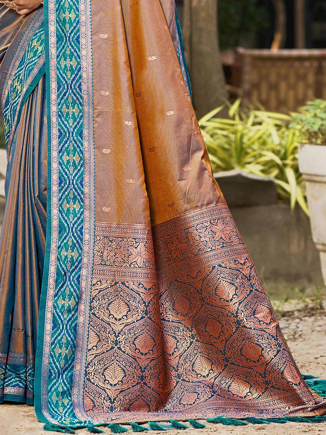 Graceful Brown Paisley & Floral Design Zari Work Silk Blend Saree With Attractive Tassels Pallu