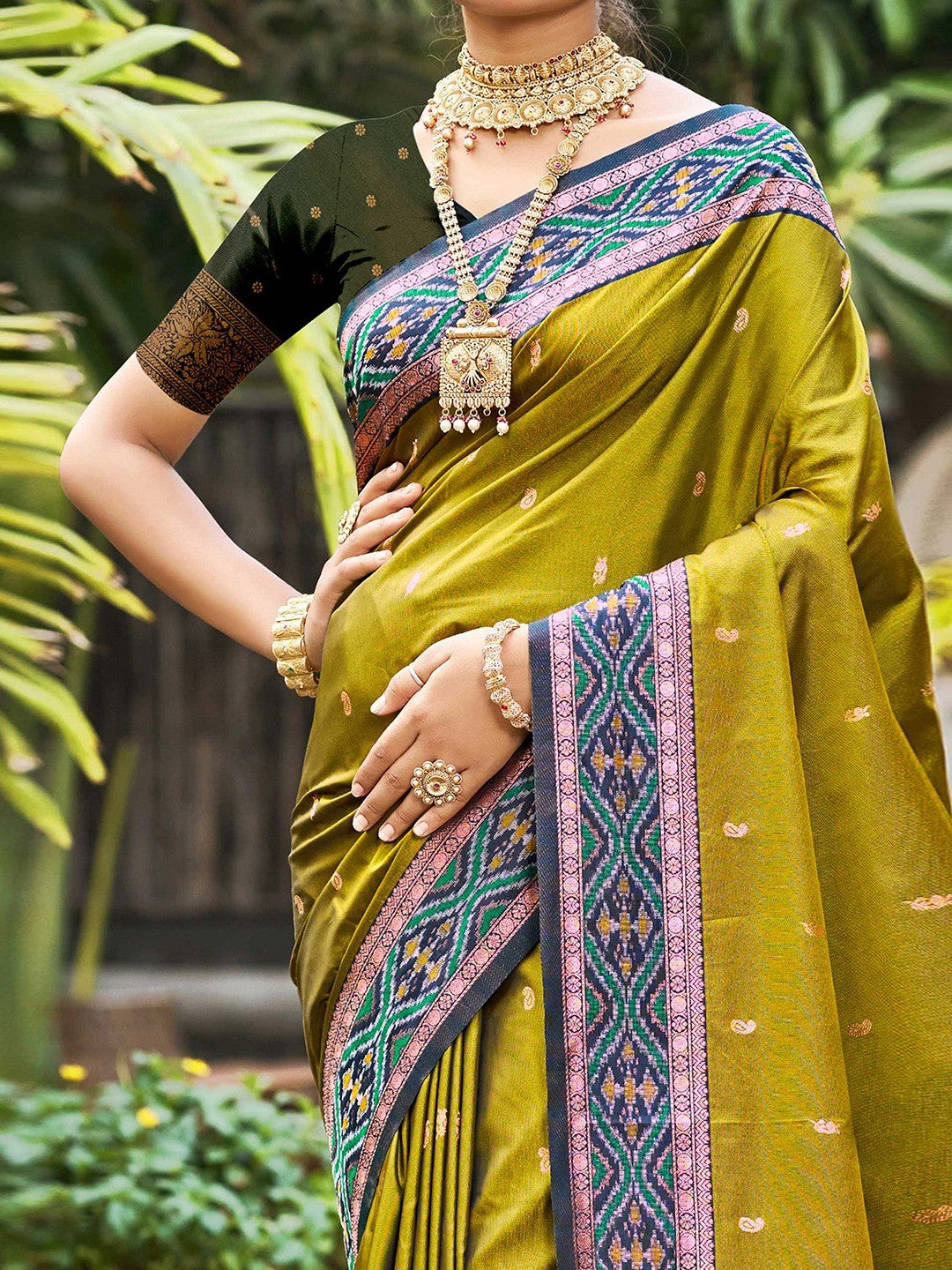 Graceful Mehendi Green Paisley & Floral Design Zari Work Silk Blend Saree With Attractive Tassels Pallu