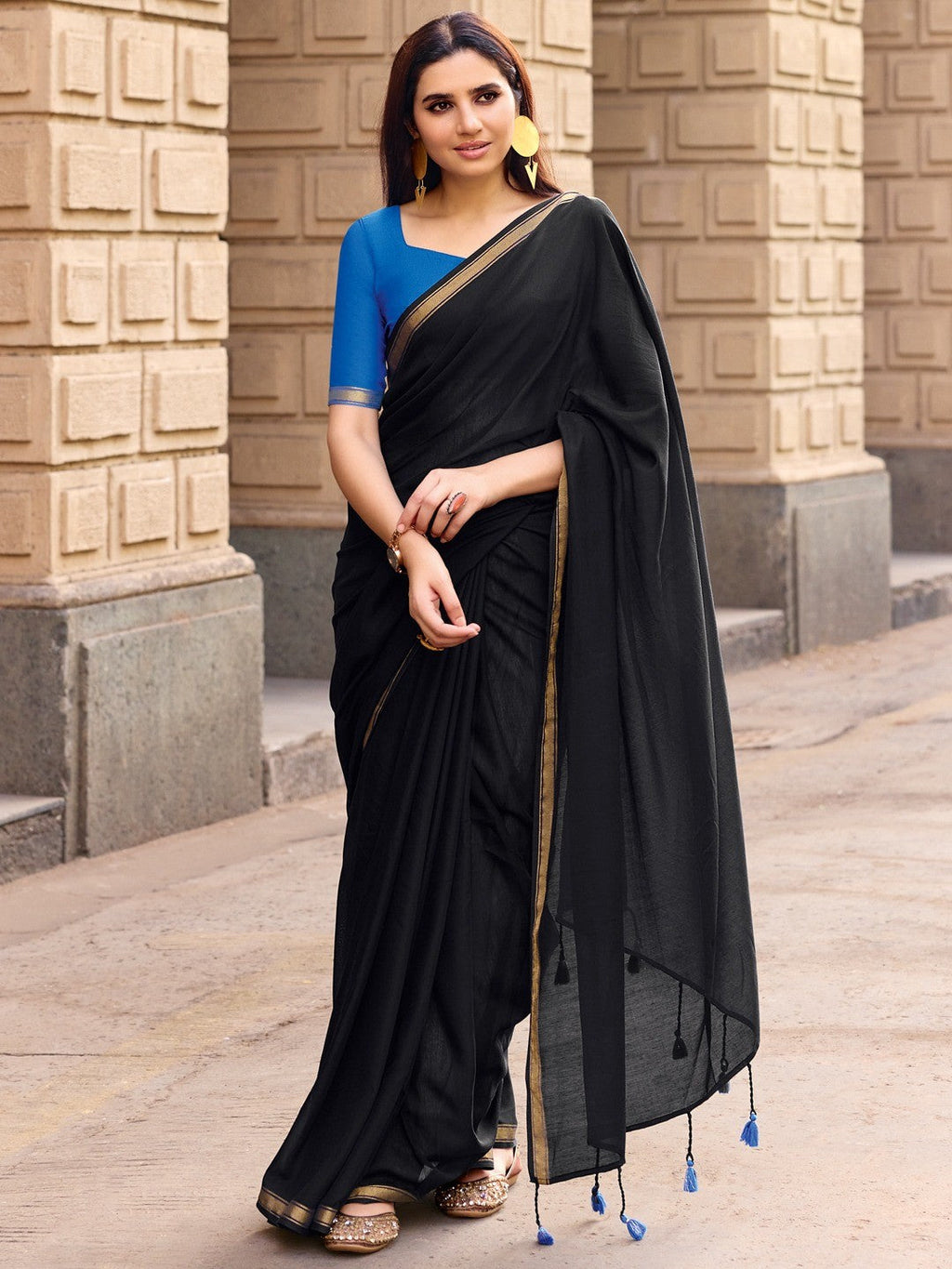 Charming Black Solid Mulmul Cotton Saree Highlighted By Zari Weaving Border & Tassel Pallu