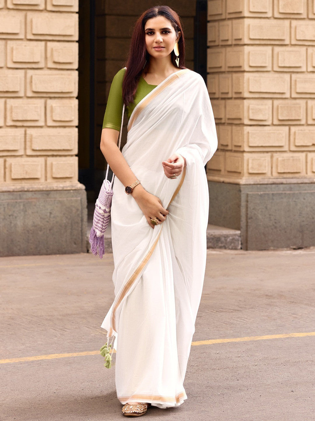 Charming White Solid Mulmul Cotton Saree Highlighted By Zari Weaving Border & Tassel Pallu
