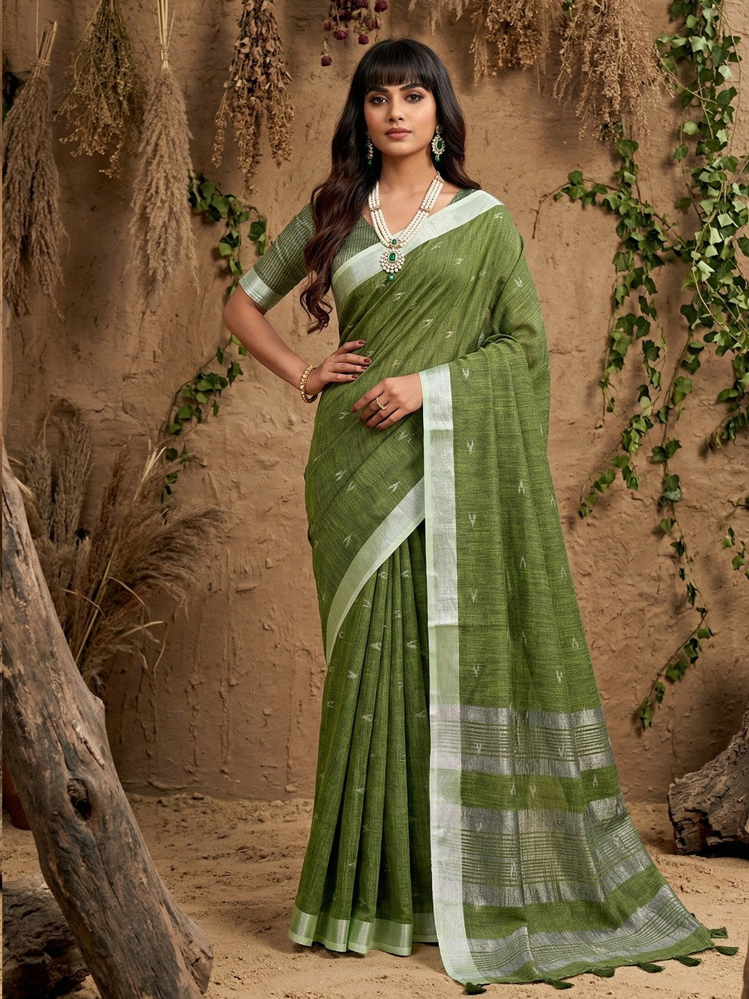 Elegant Green Linen Saree with Silver Border Lightweight Festive Ethnic Wear