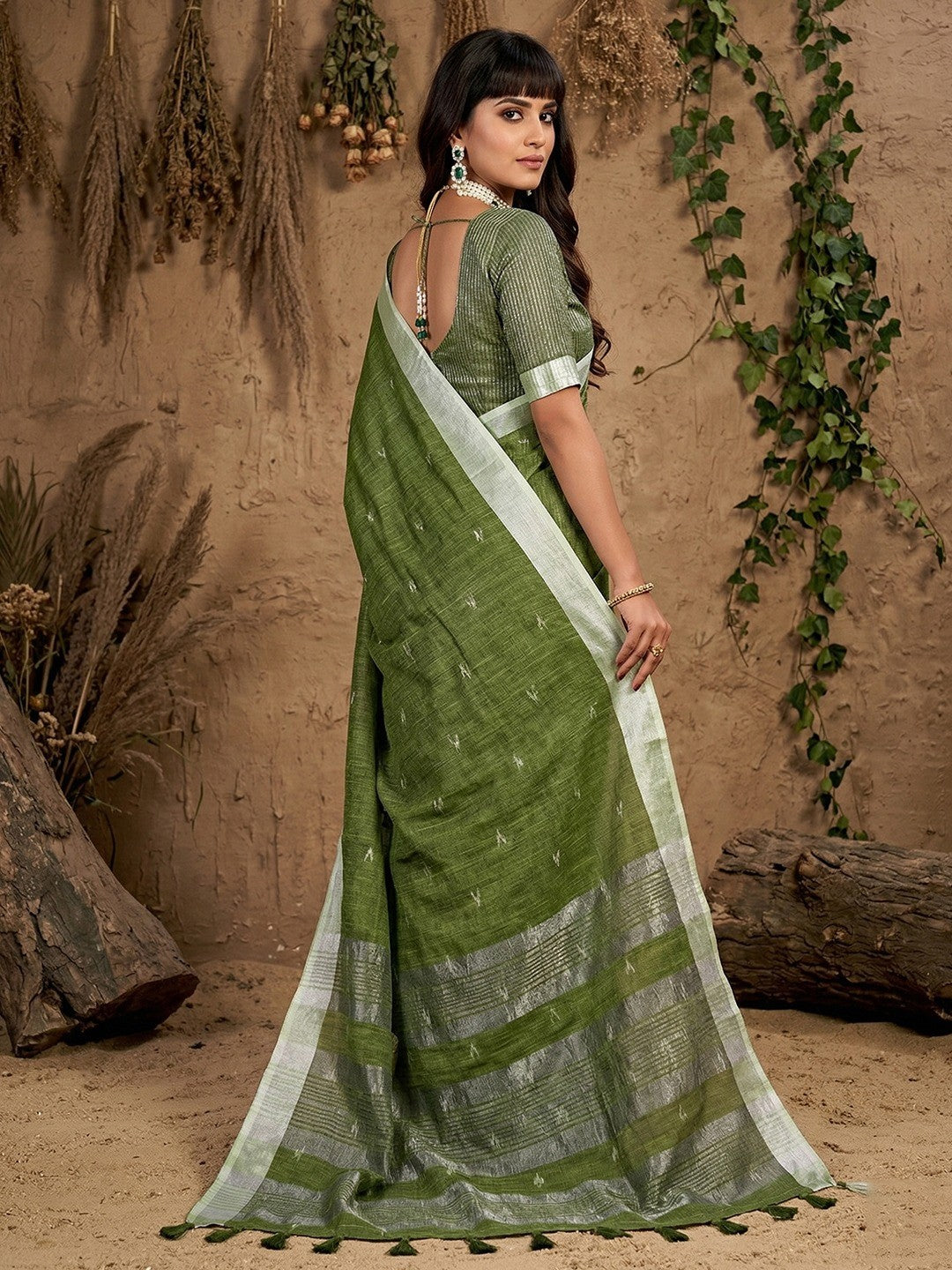 Elegant Green Linen Saree with Silver Border Lightweight Festive Ethnic Wear
