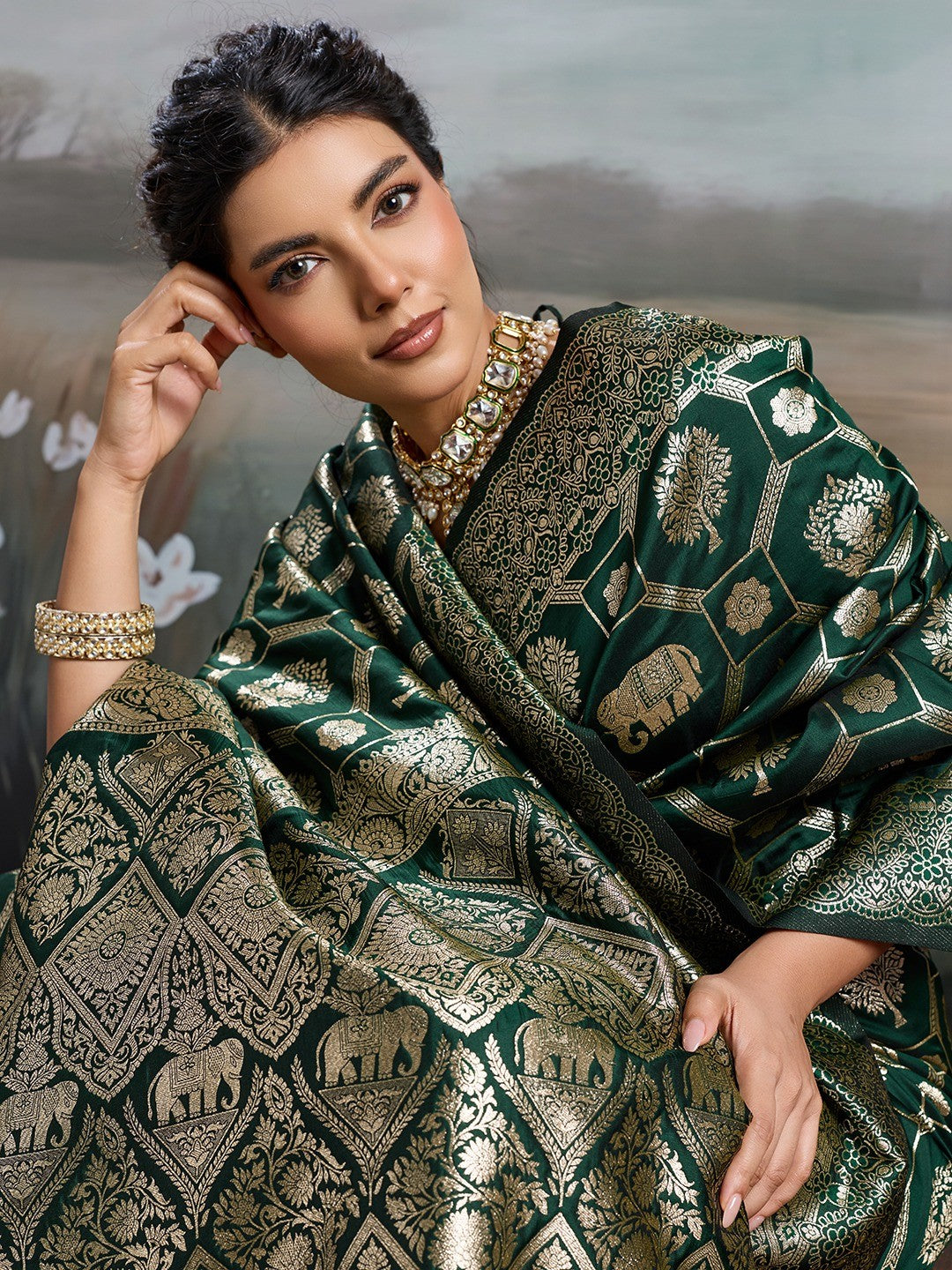 Graceful Green Floral & Elephant Motif Silk Blend Saree With Zari Weaving & Tassels Pallu