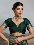 Graceful Green Floral & Elephant Motif Silk Blend Saree With Zari Weaving & Tassels Pallu