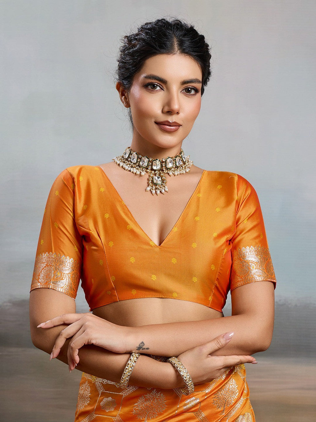 Elegant Orange Floral & Elephant Motif Silk Blend Saree with Zari Work