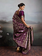 Graceful Wine Floral & Elephant Motif Silk Blend Saree With Zari Weaving & Tassels Pallu