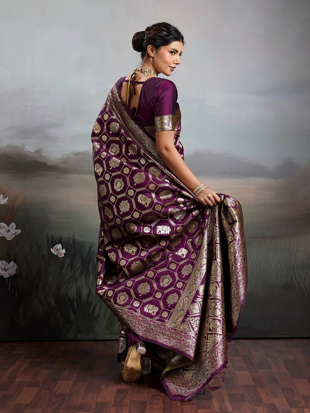 Graceful Wine Floral & Elephant Motif Silk Blend Saree With Zari Weaving & Tassels Pallu