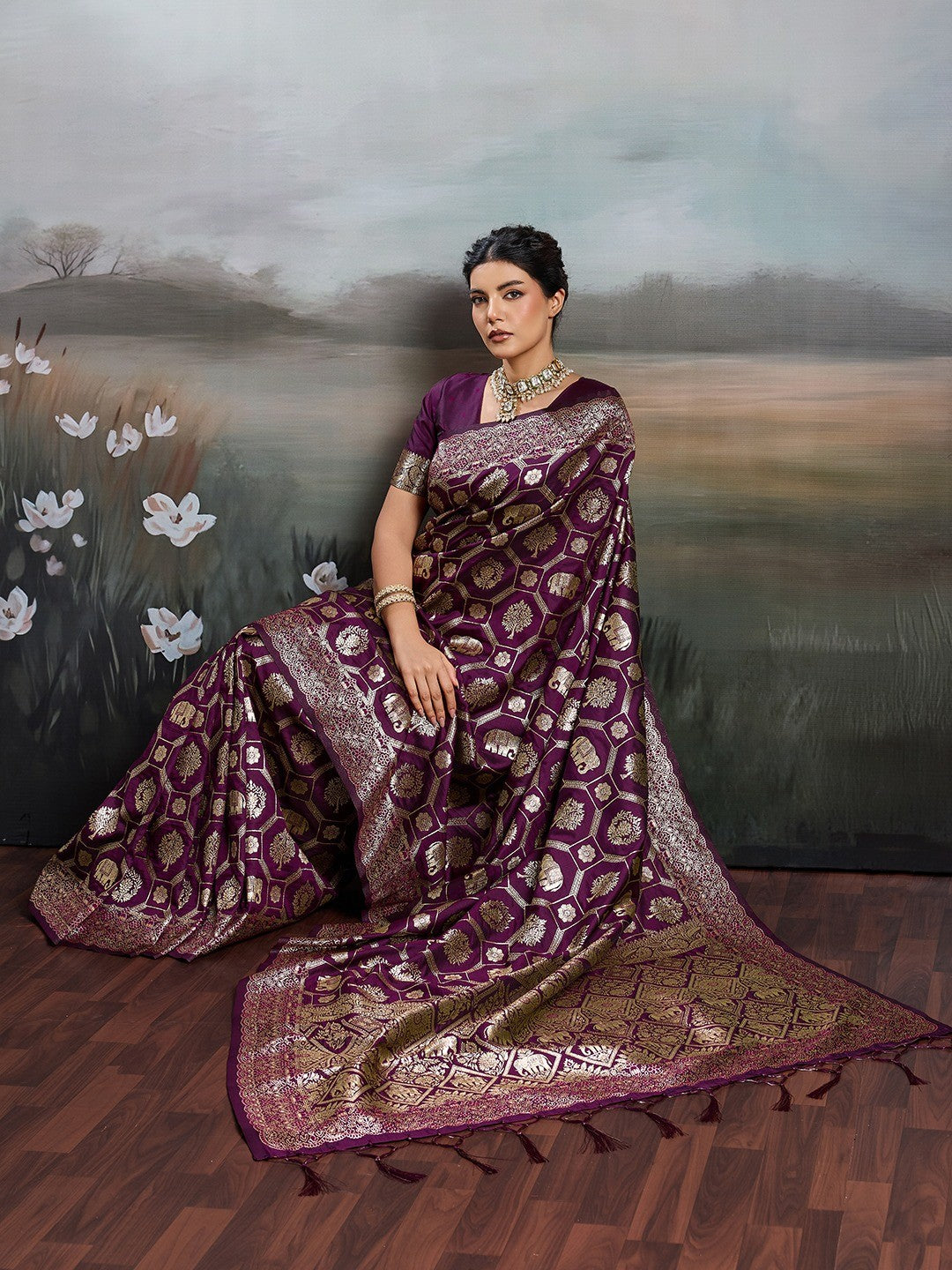 Graceful Wine Floral & Elephant Motif Silk Blend Saree With Zari Weaving & Tassels Pallu