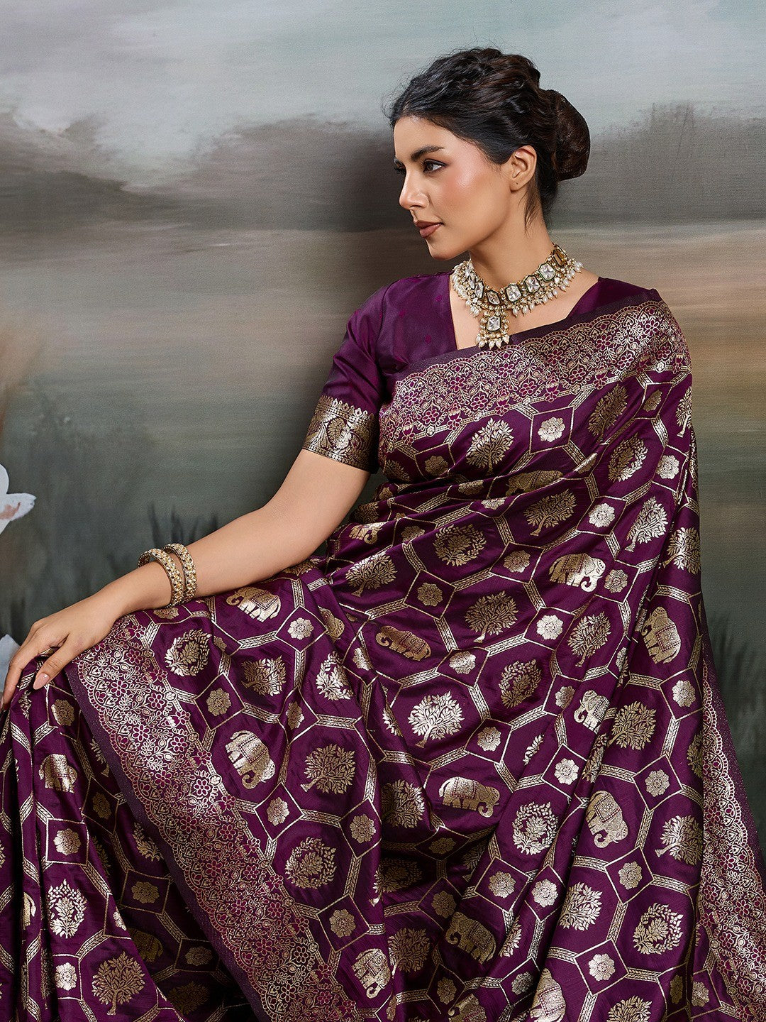 Graceful Wine Floral & Elephant Motif Silk Blend Saree With Zari Weaving & Tassels Pallu
