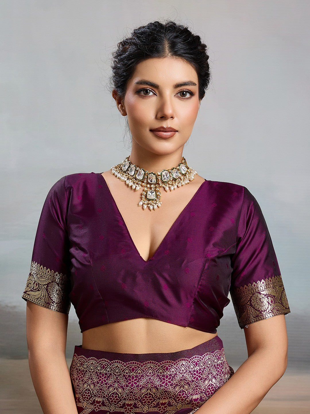 Graceful Wine Floral & Elephant Motif Silk Blend Saree With Zari Weaving & Tassels Pallu