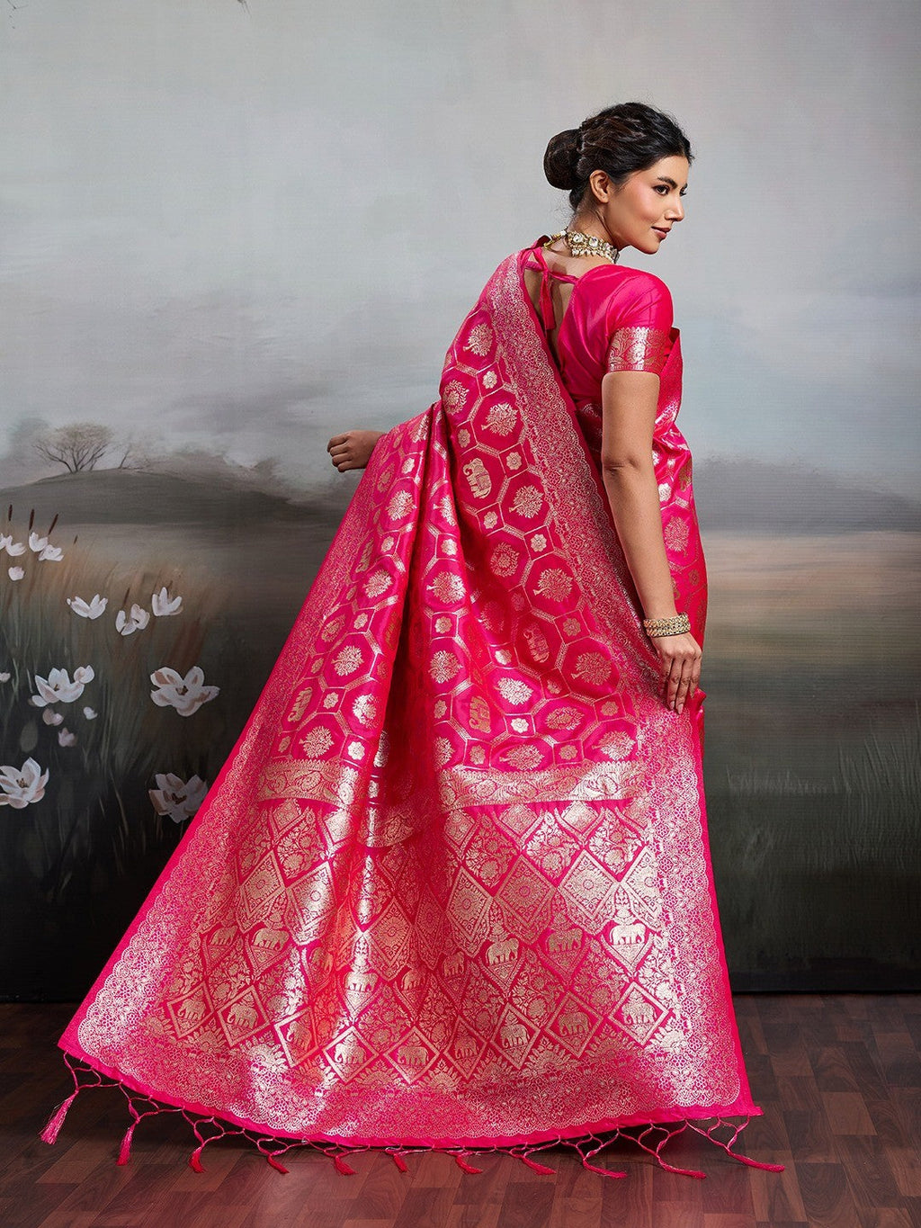 Graceful Rani Pink Floral & Elephant Motif Silk Blend Saree With Zari Weaving & Tassels Pallu
