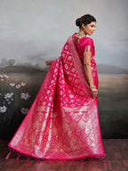 Graceful Rani Pink Floral & Elephant Motif Silk Blend Saree With Zari Weaving & Tassels Pallu