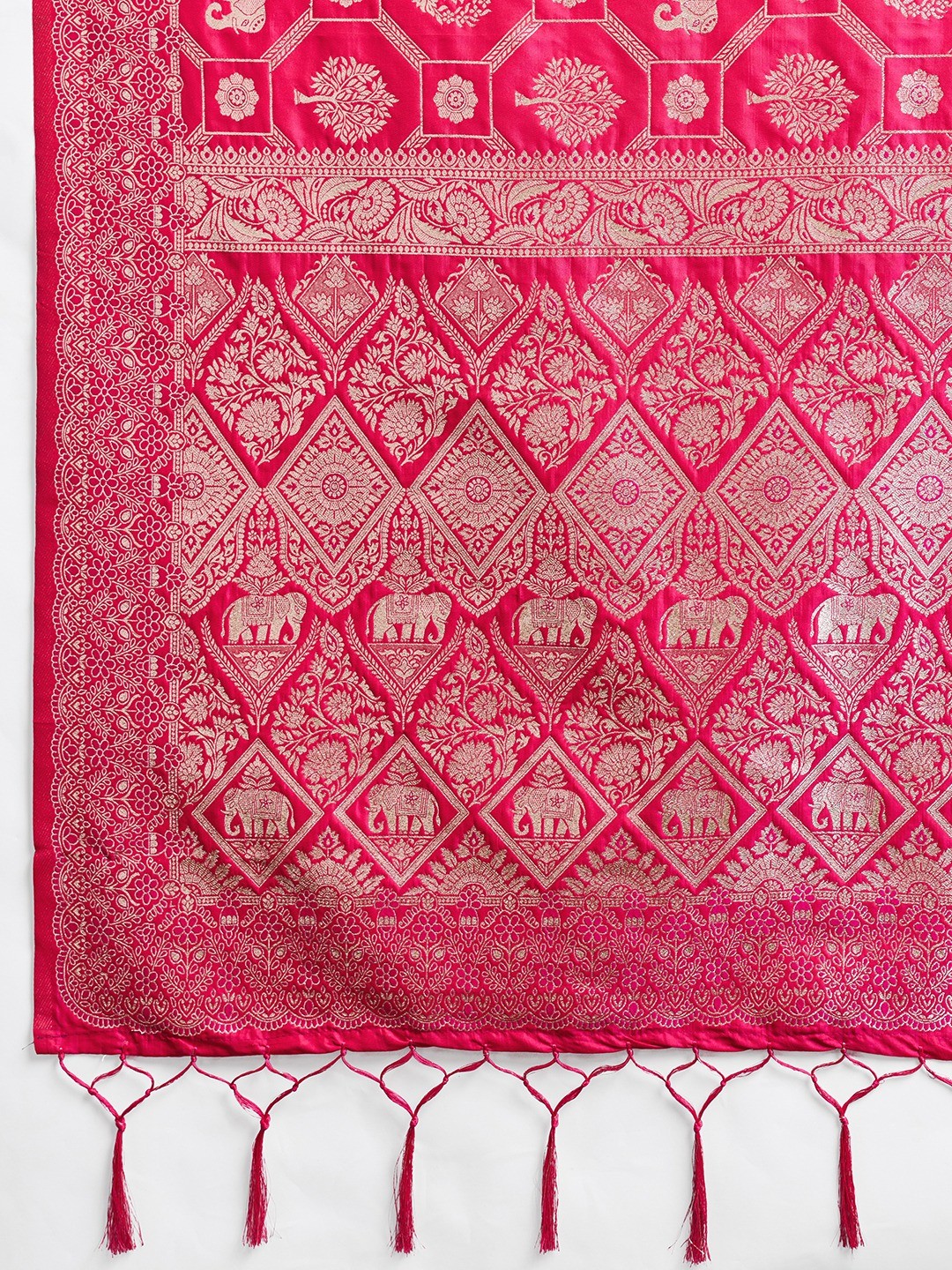 Graceful Rani Pink Floral & Elephant Motif Silk Blend Saree With Zari Weaving & Tassels Pallu