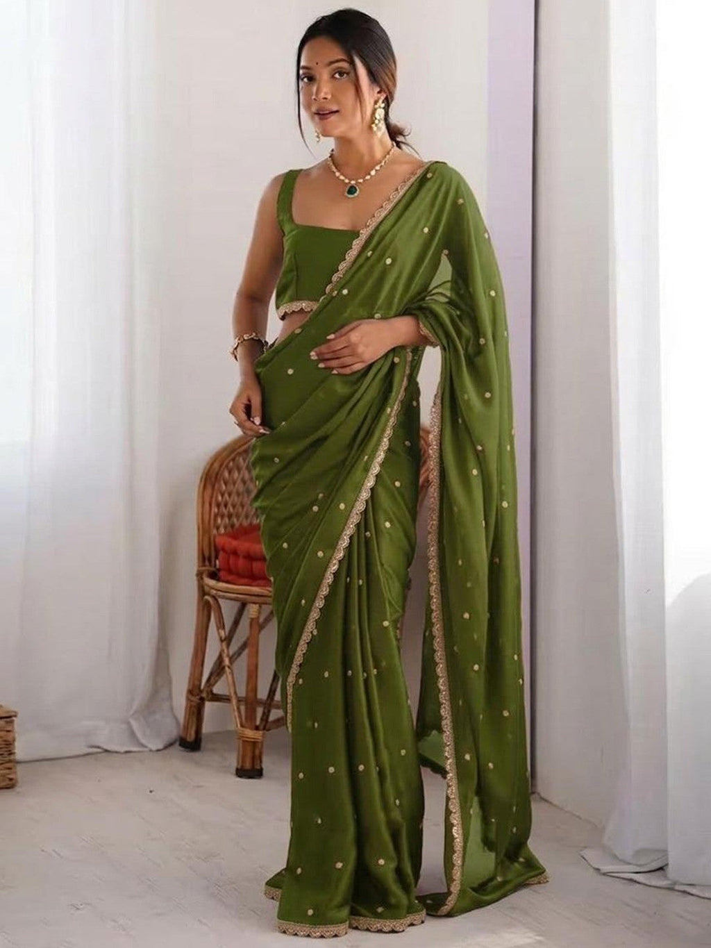 Green Georgette Silk Party Wear Saree with Elegant Sequins Embellishment