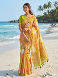 Elegant Yellow Linen Saree with Floral Print and Tassel Details