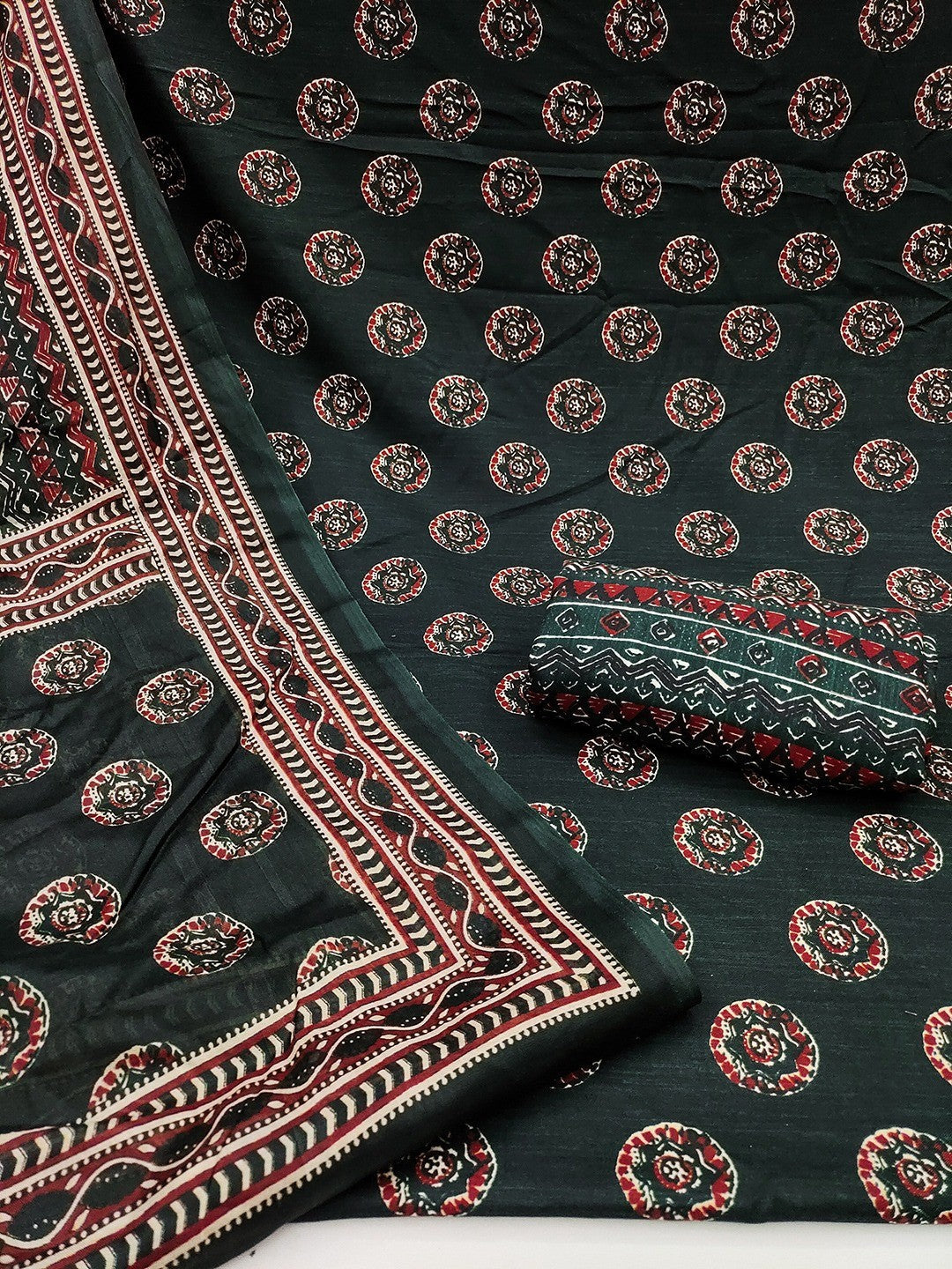 Exclusive Dark Bottle Green Geometric Printed Rayon Dress Material With Delicate Design Finish