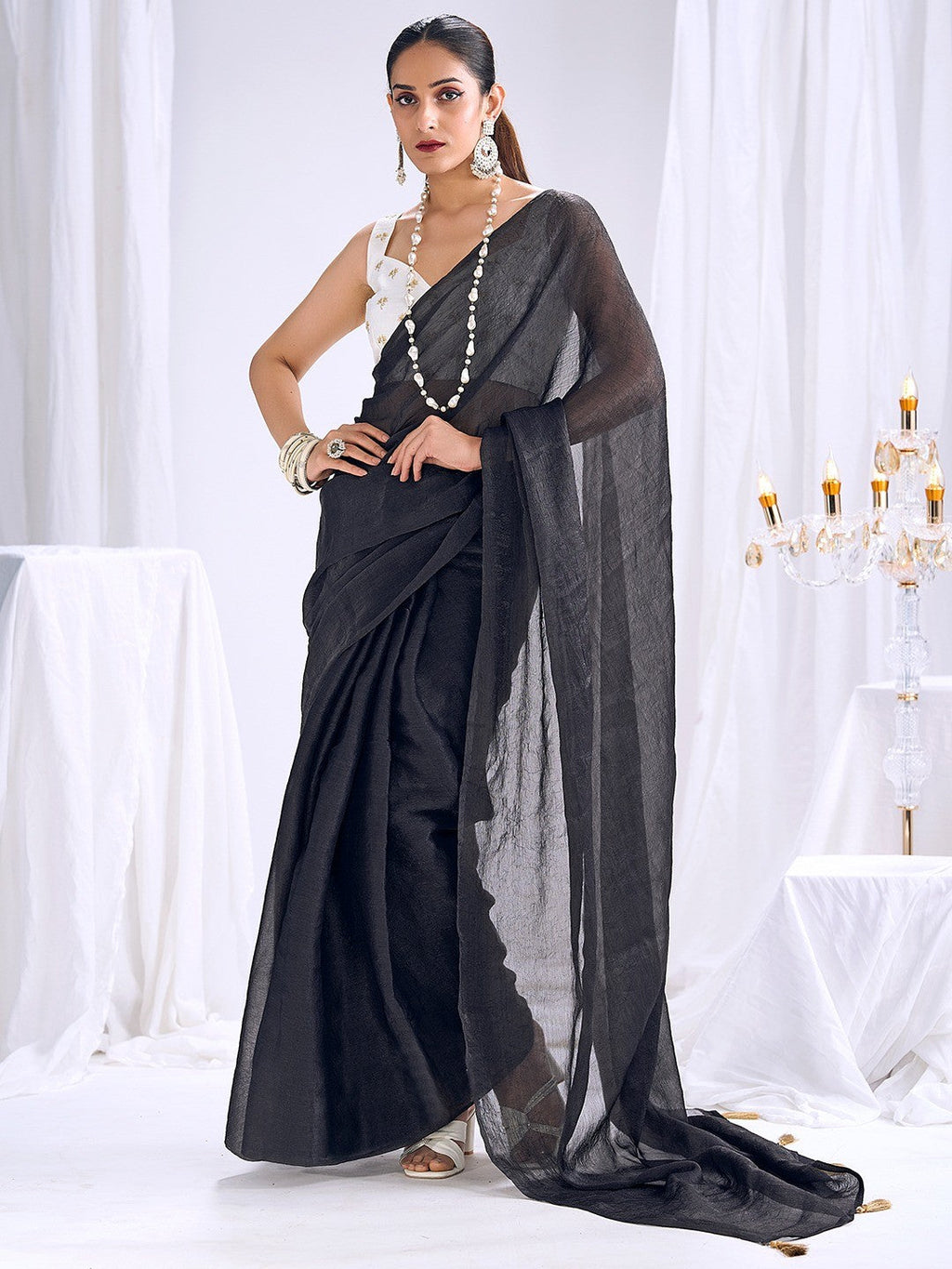 Graceful Black Art Silk Party Wear Saree With Minimal Solid Design & Tassel Pallu