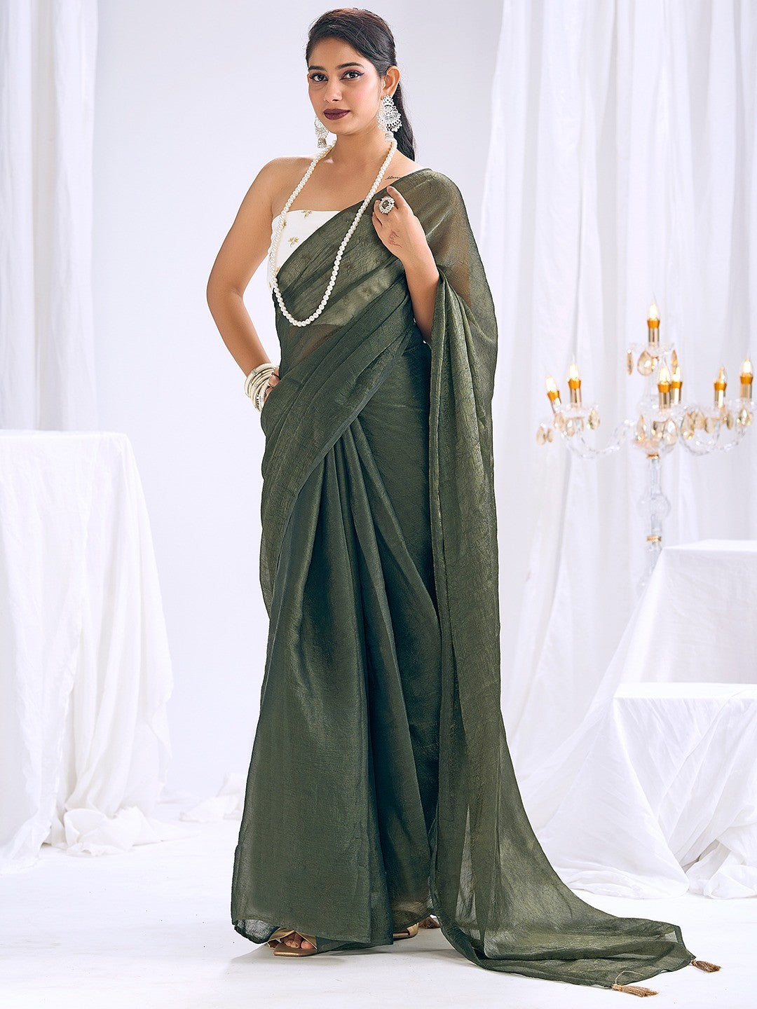 Graceful Green Art Silk Party Wear Saree With Minimal Solid Design & Tassel Pallu