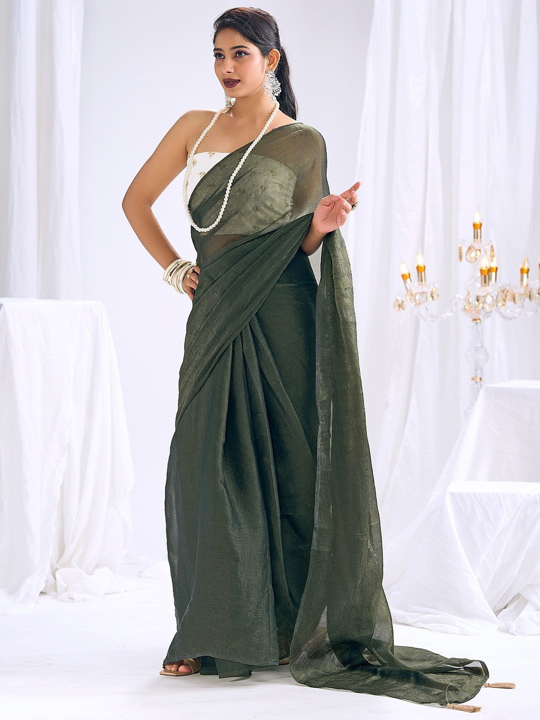 Graceful Green Art Silk Party Wear Saree With Minimal Solid Design & Tassel Pallu
