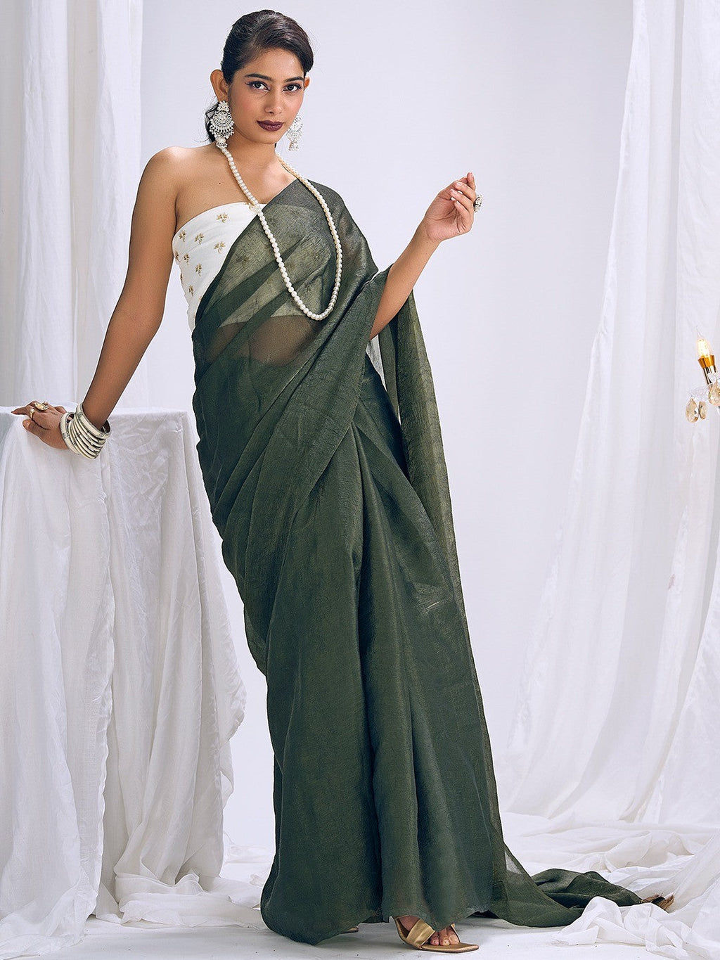 Graceful Green Art Silk Party Wear Saree With Minimal Solid Design & Tassel Pallu