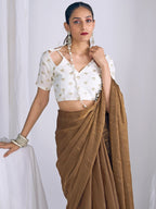 Graceful Brown Art Silk Party Wear Saree With Minimal Solid Design & Tassel Pallu