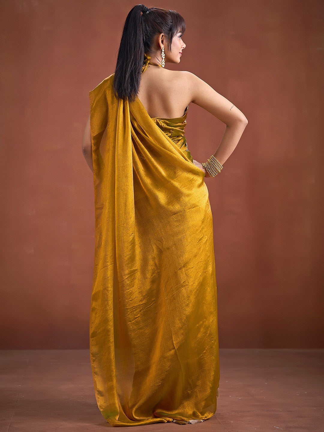 Trendy Mustard Solid Art Silk Saree With Stylish Belt & Tassel Pallu Detailing