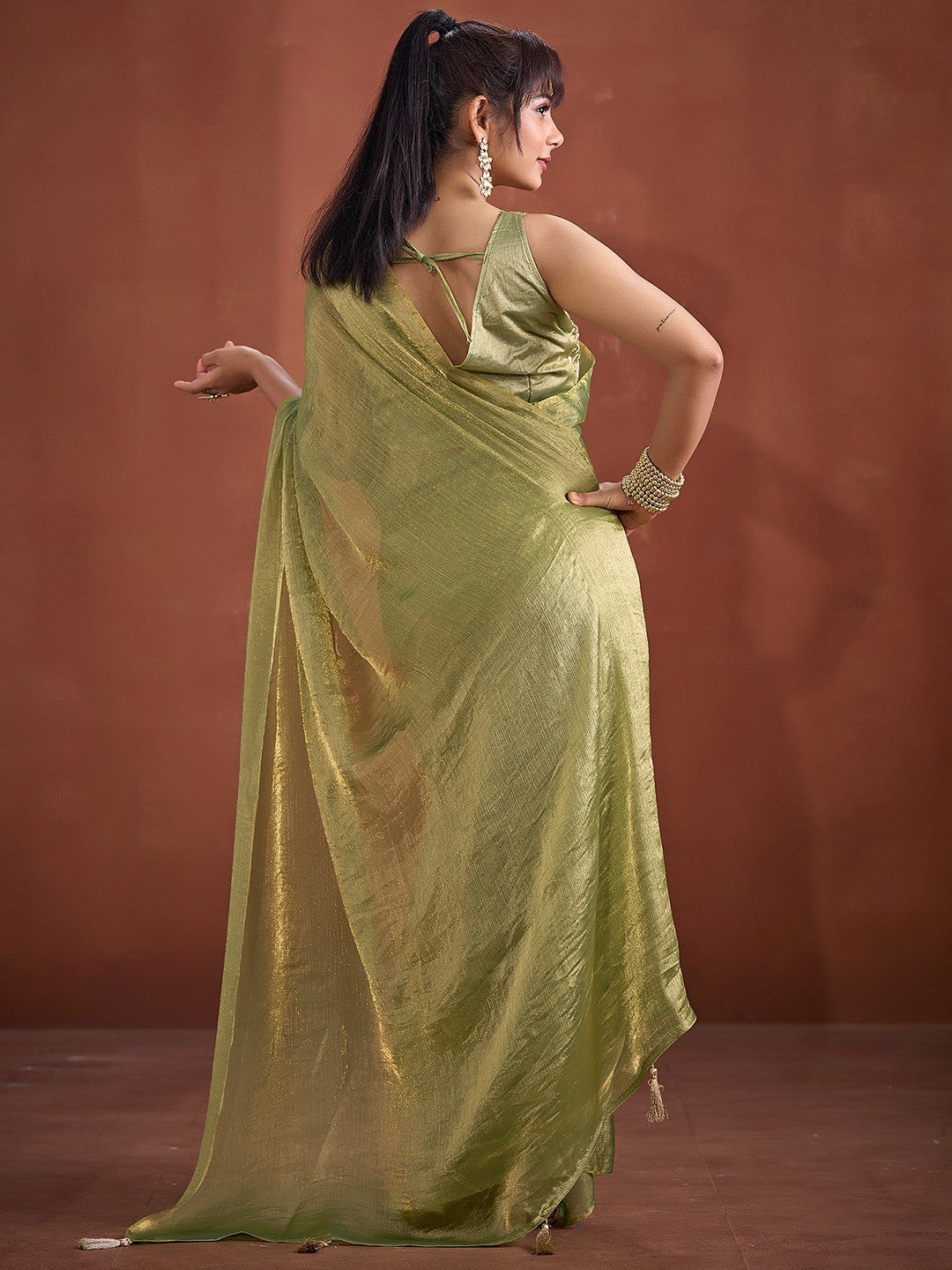 Trendy Pista Green Solid Art Silk Saree With Stylish Belt & Tassel Pallu Detailing