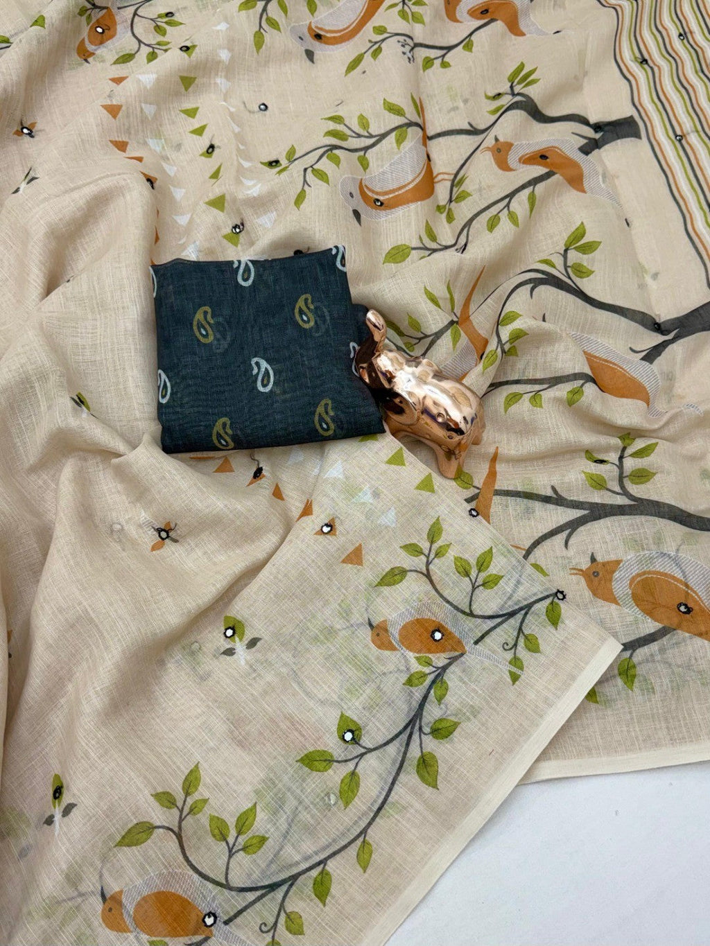 Stylish Cream Linen Saree with Multicolor Printed Motifs Minimal Elegant Look