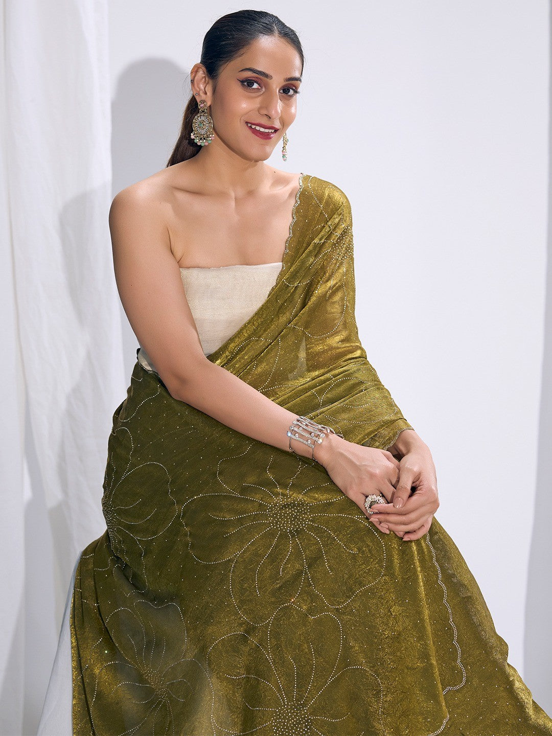 Stunning Olive Satin Silk Saree Highlighting Floral Stone Work Craftsmanship