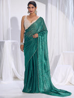 Stunning Teal Satin Silk Saree Highlighting Floral Stone Work Craftsmanship
