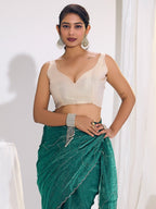 Stunning Teal Satin Silk Saree Highlighting Floral Stone Work Craftsmanship