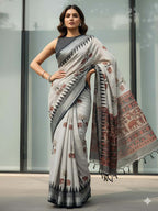Elegant Grey Linen Saree With Elephant Print and Zig Zag Geometric Border