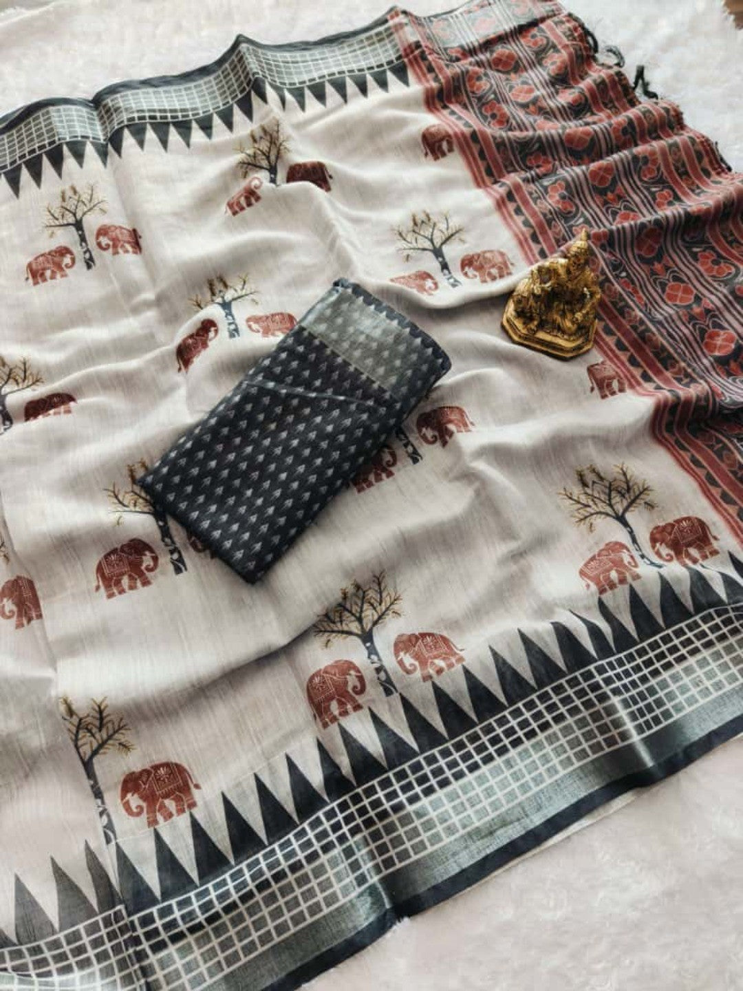 Elegant Grey Linen Saree With Elephant Print and Zig Zag Geometric Border