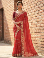 Sophisticated Coral Pink Striped Pattern Georgette Saree With Floral Thread Embroidered Border